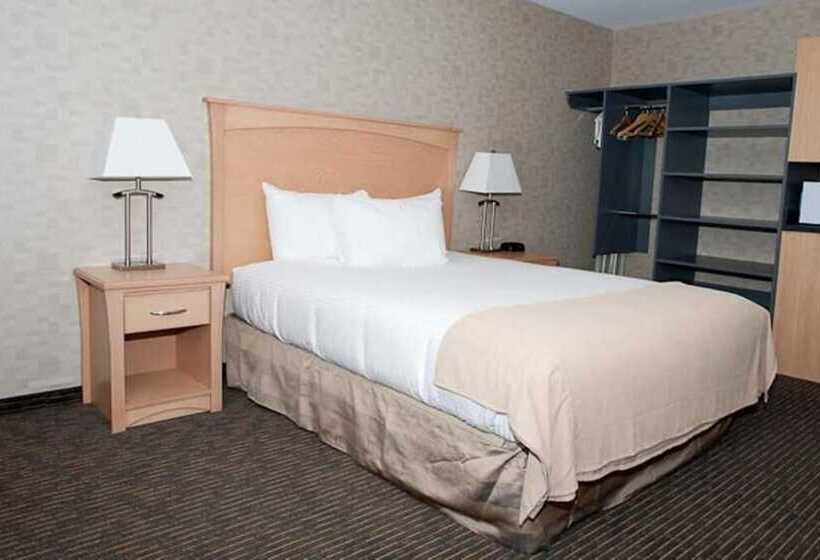 Отель Paradise Inn And Suites