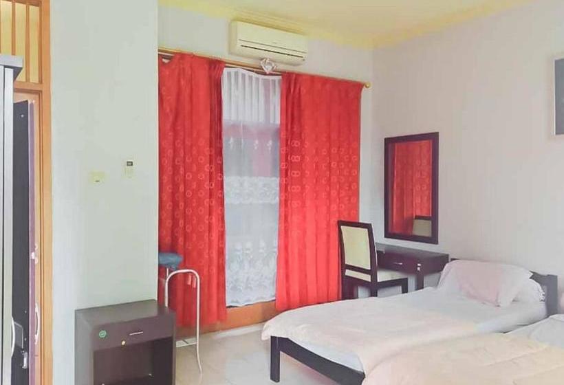 Hotel Rumah Pahoman Syariah Mitra Reddoorz