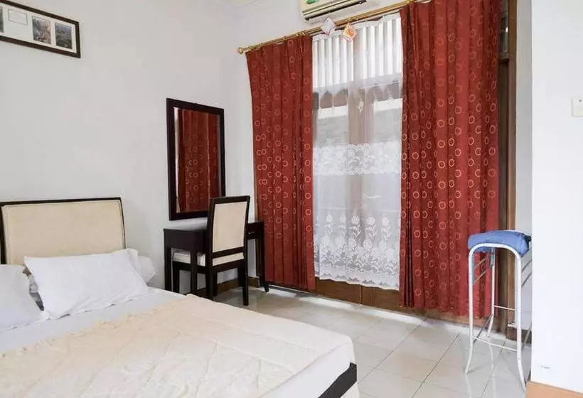 Hotelli Rumah Pahoman Syariah Mitra Reddoorz