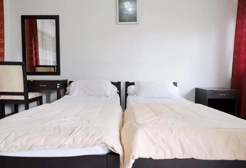 Hotelli Rumah Pahoman Syariah Mitra Reddoorz