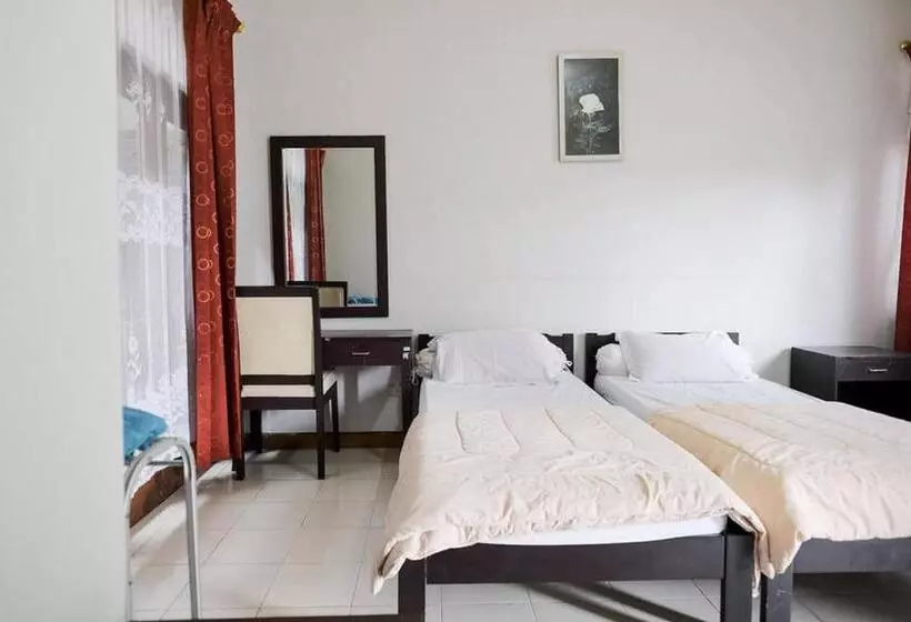 Hotelli Rumah Pahoman Syariah Mitra Reddoorz