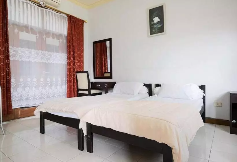 Hotelli Rumah Pahoman Syariah Mitra Reddoorz