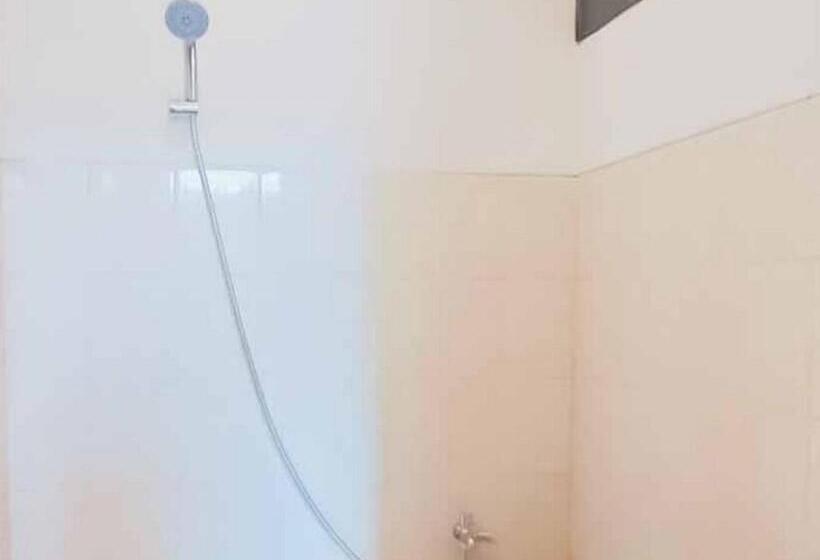 Hotel Rumah Pahoman Syariah Mitra Reddoorz