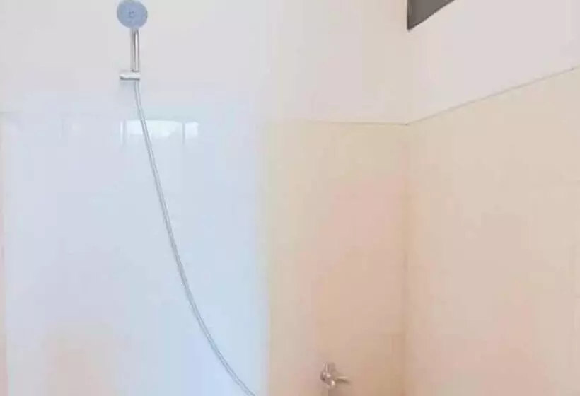 Hotelli Rumah Pahoman Syariah Mitra Reddoorz