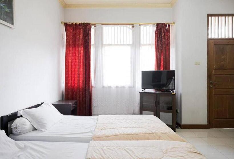 Hotel Rumah Pahoman Syariah Mitra Reddoorz