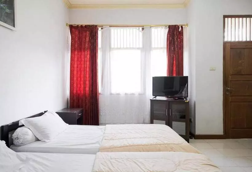 Hotelli Rumah Pahoman Syariah Mitra Reddoorz