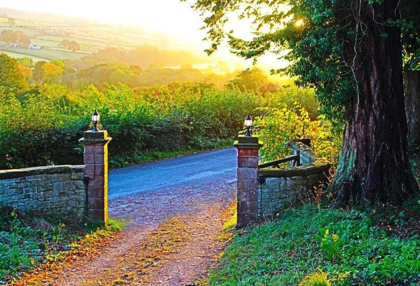 펜션 Woodlands Country House & Cottage