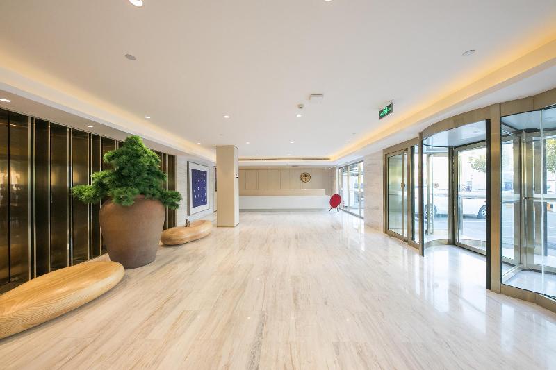 Отель Piao Home Inn Beijing Guo Mao East