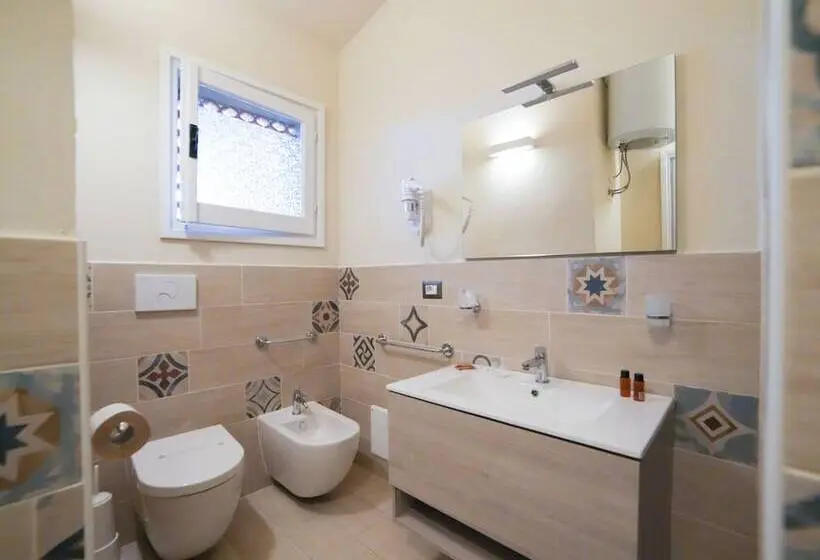 Hotelli Mimose Beach Village