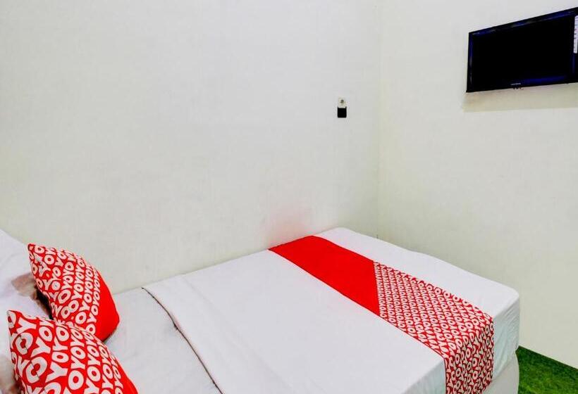 Отель Oyo 90725 Zeevanna Guest House Syariah