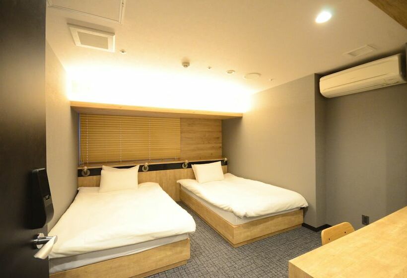 胶囊酒店 First Cabin Midosujinamba