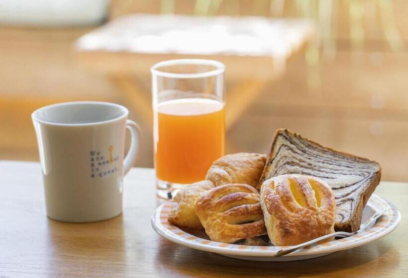 Отель Wing International Korakuen