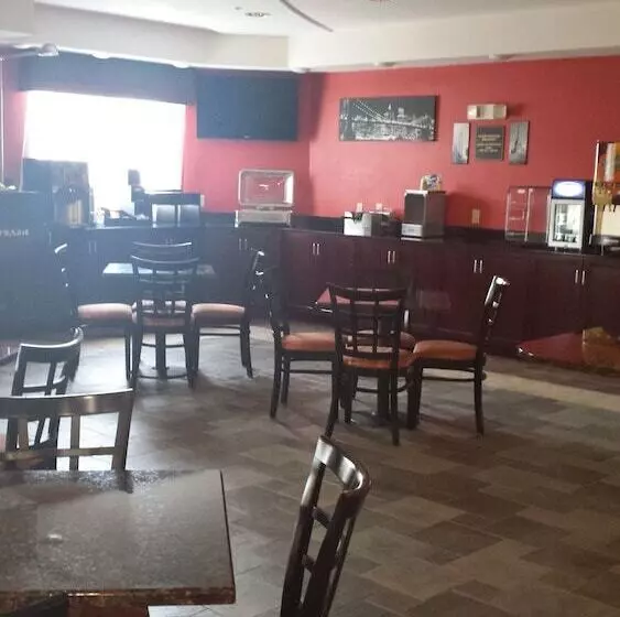 Отель Paradise Inn & Suites