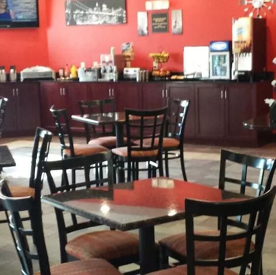 Отель Paradise Inn & Suites