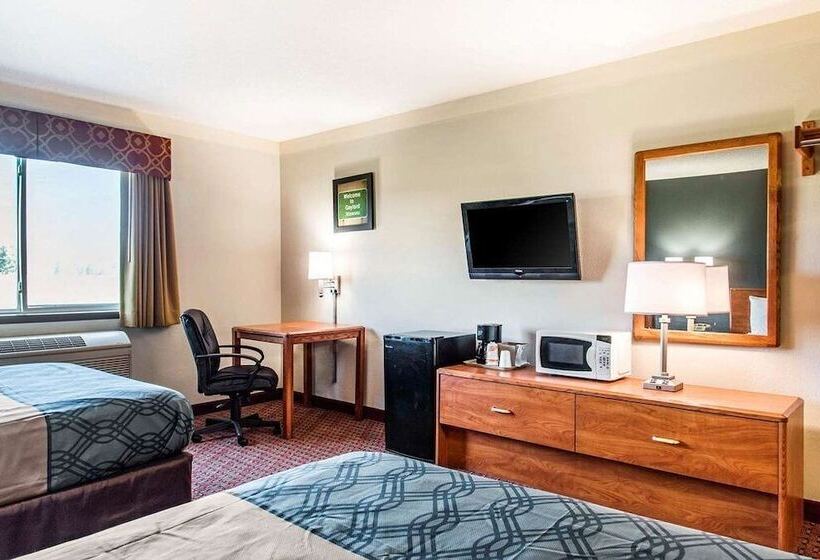 Отель Travelers Lodge & Suites