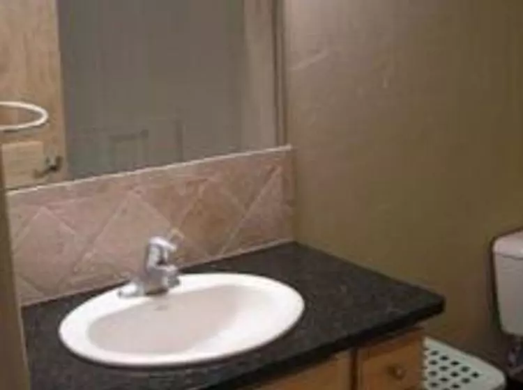 Отель Complejo Centennial Suites Extended Stay Lodge