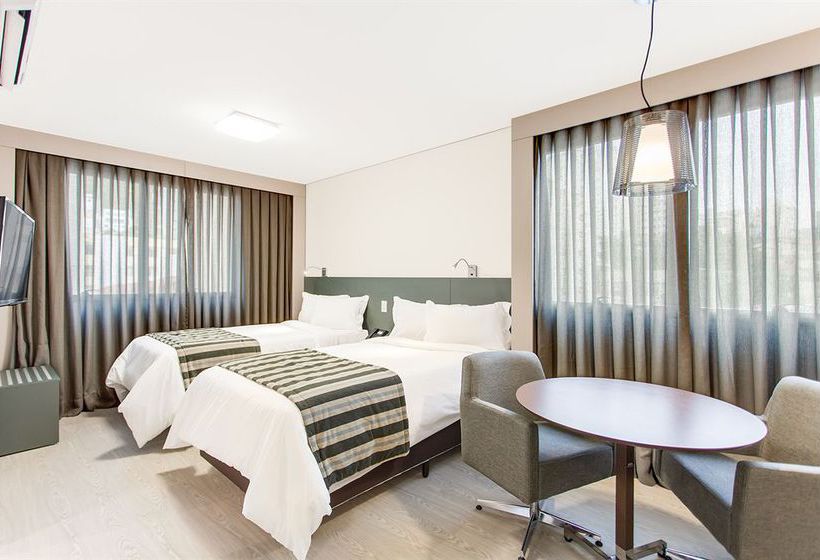 Отель Esuites Sion  Savassi