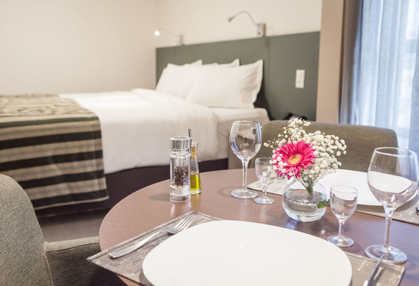 Отель Esuites Sion  Savassi