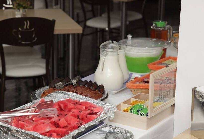 Отель Mimosa Suites