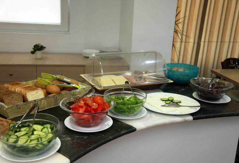 Отель Mimosa Suites