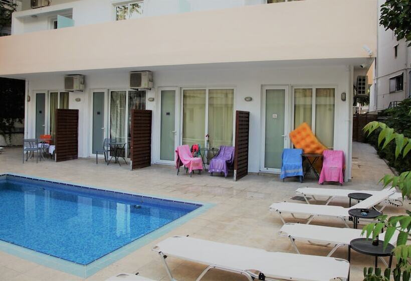 Отель Mimosa Suites