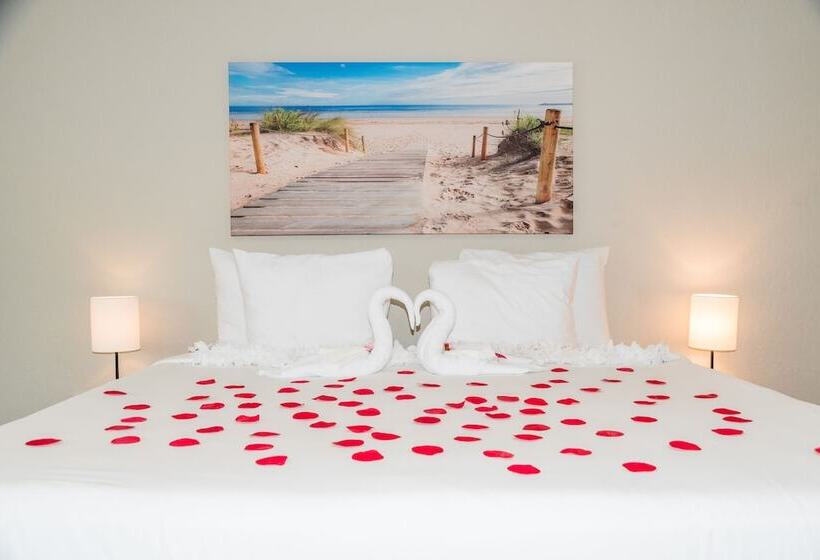 فندق Surf & Sand