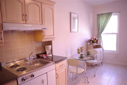 فندق Urban Living Suites