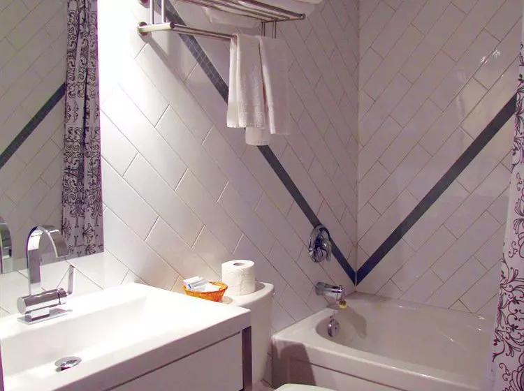 Отель Urban Living Suites