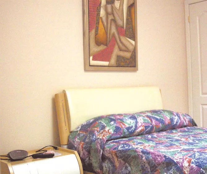 Отель Urban Living Suites