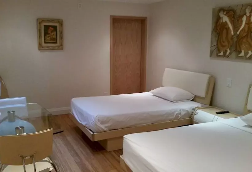 Отель Urban Living Suites