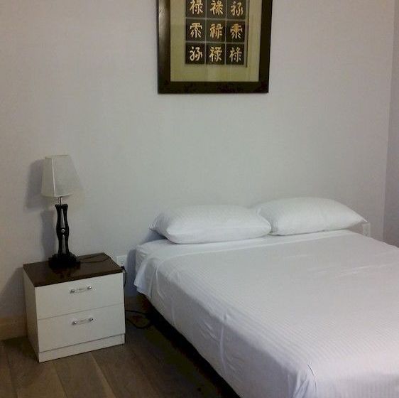 فندق Urban Living Suites