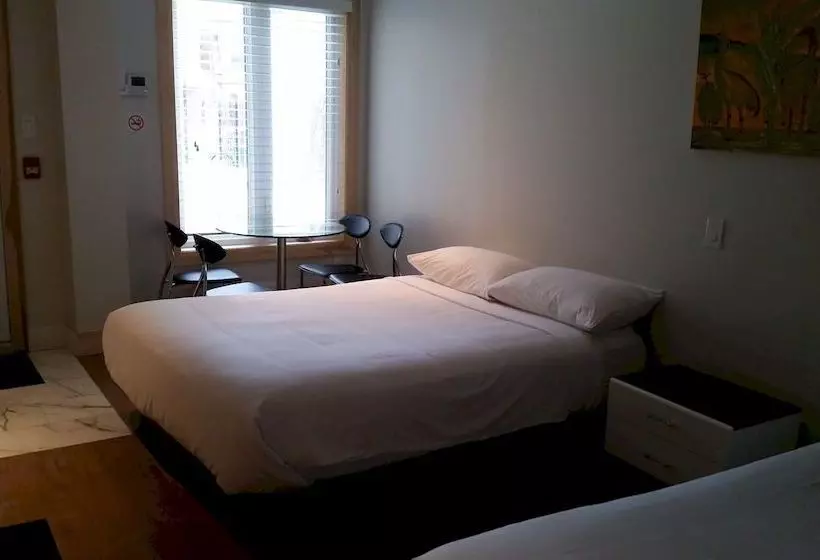 Отель Urban Living Suites