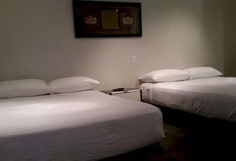 Отель Urban Living Suites