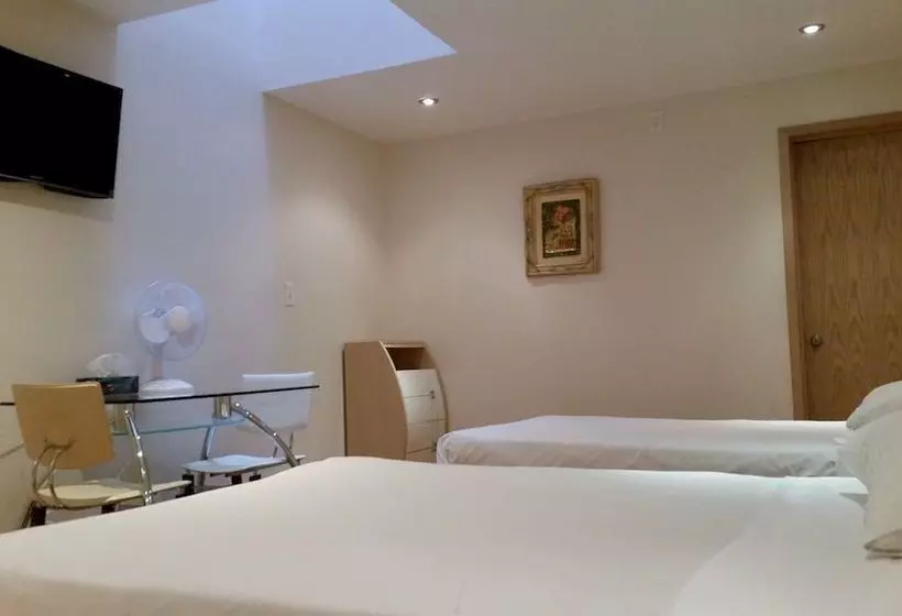 Отель Urban Living Suites