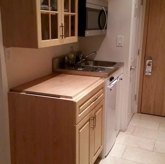 Отель Urban Living Suites