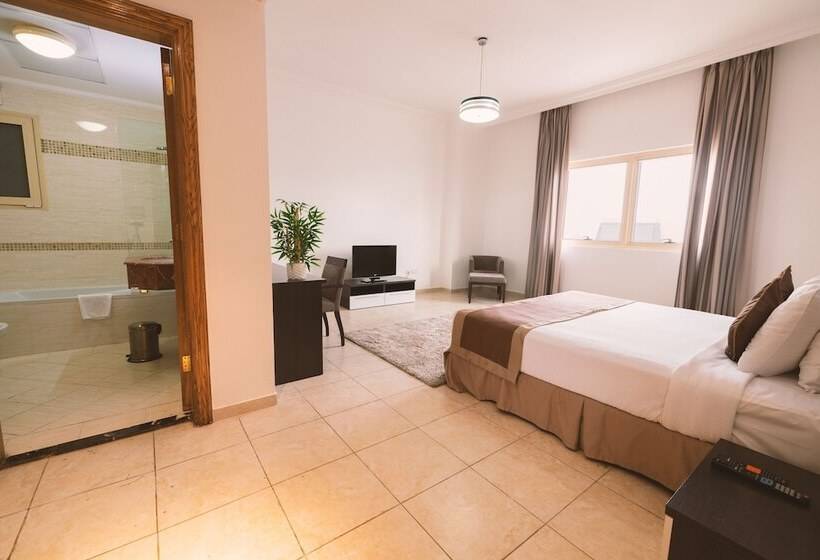 اقامتگاه Magnum Hotel & Suites West Bay