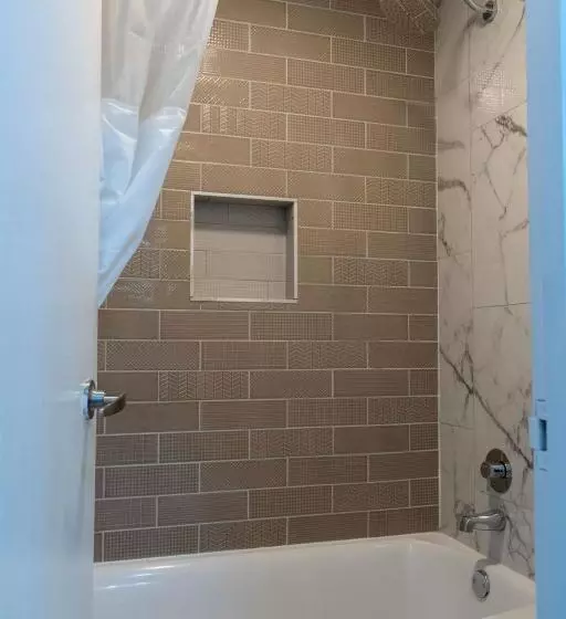 Hotelli Dragonfly Inn & Suites