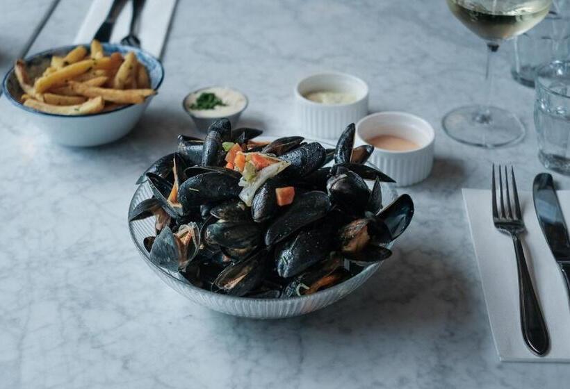 酒店 Café Koophandel