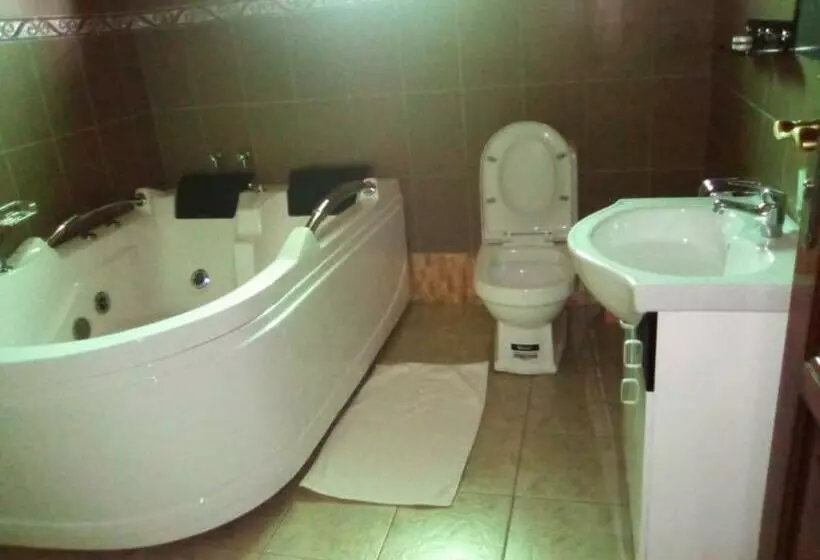 تختخواب و صبحانه A &j Holiday Suites