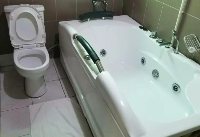 تختخواب و صبحانه A &j Holiday Suites