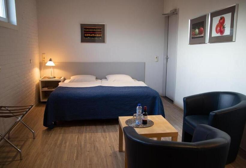 酒店 Gastenverblijf  T Smedenhuys