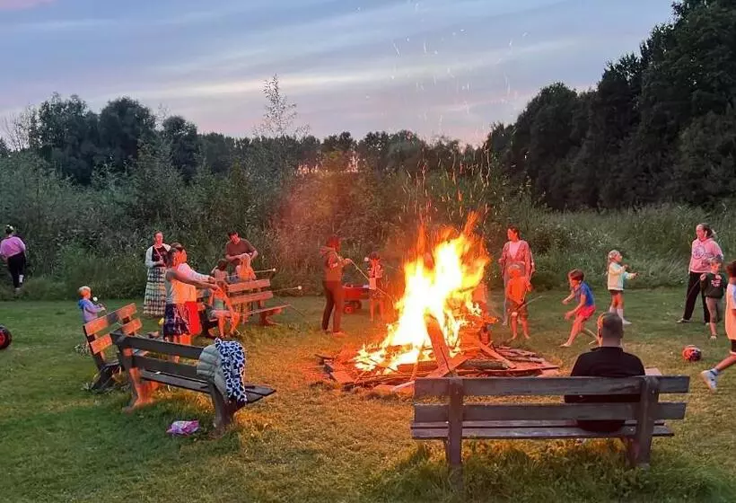 Green Tiny House With Shared Pool