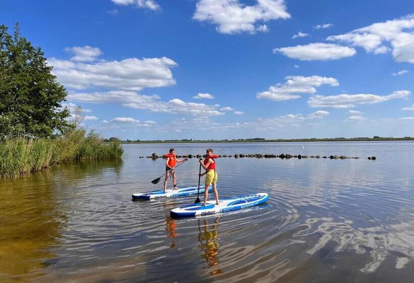 Green Tiny House With Shared Pool