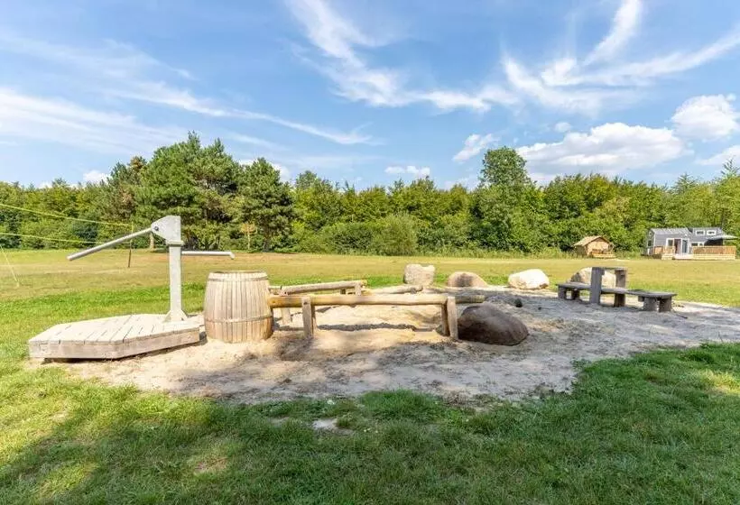 Green Tiny House With Shared Pool
