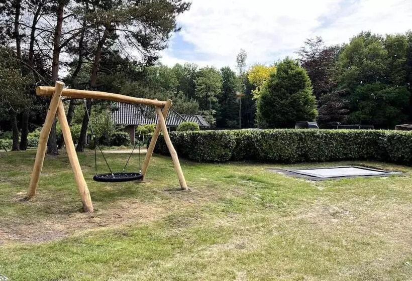 Green Tiny House With Shared Pool