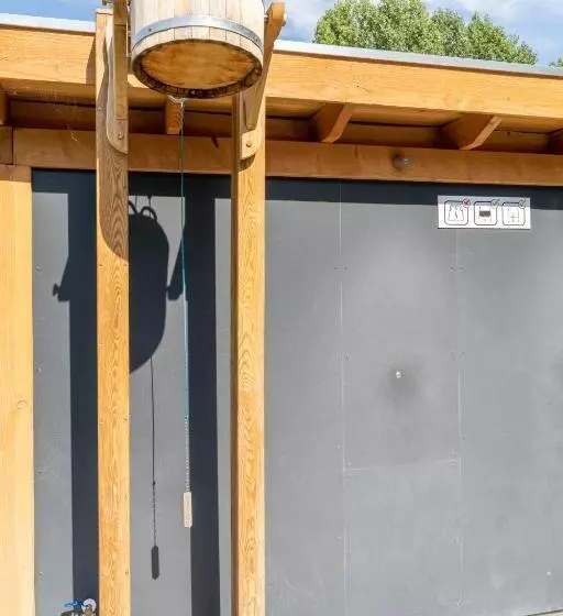 Green Tiny House With Shared Pool