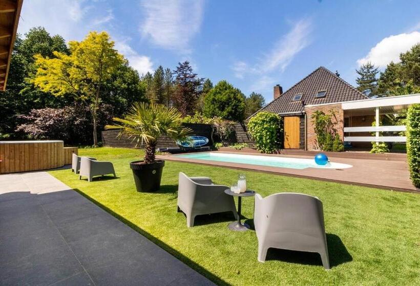 Green Tiny House With Shared Pool