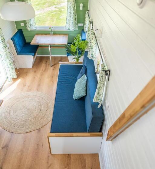 Green Tiny House With Shared Pool