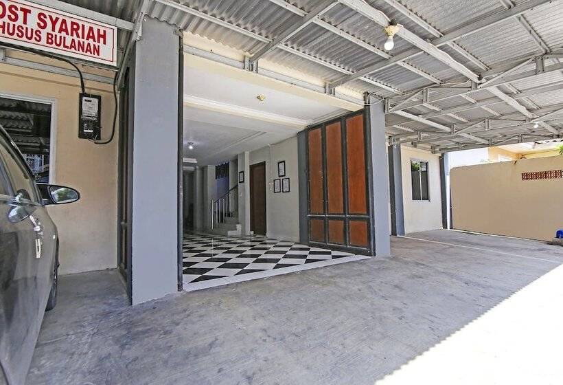 בית מלון כפרי Oyo 90883 Ria Agustar Syariah