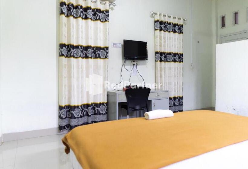 Hotell Wisma Aini Syariah Mitra Reddoorz